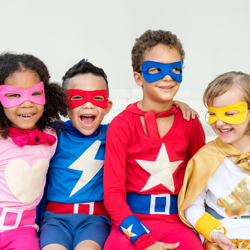 kids dressed as super heroes